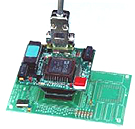 IDC uses in-circuit emulators and debuggers to insure proper operation during development.
